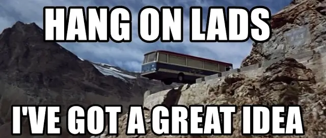 image taken from the end of the classic movie &quot;The Italian Job&quot; of the bus hanging half off a mountainside